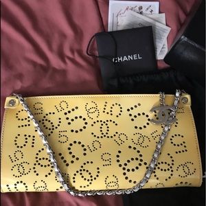 CHANEL NO5 yellow perforated patent leather bag